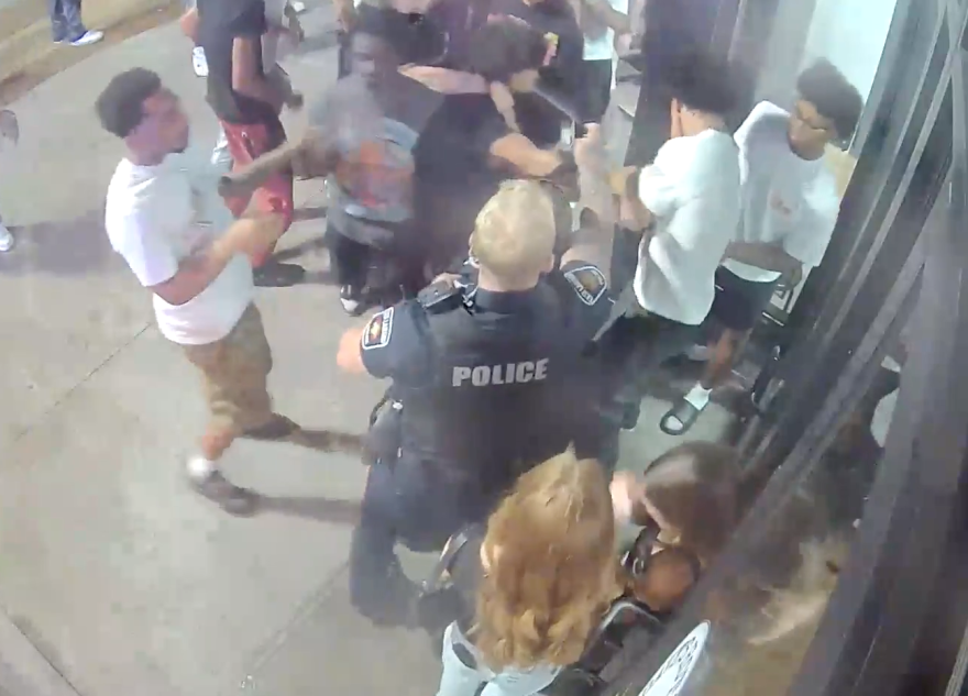 Security-camera still of the Welcome Weekend incident involving Lonnie Smith and Mason Woods